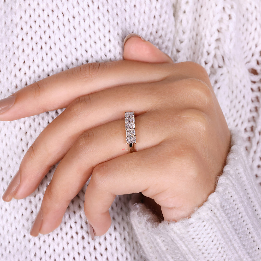 Elegant seven stone wedding band featuring sparkling diamonds for a luxurious look.
