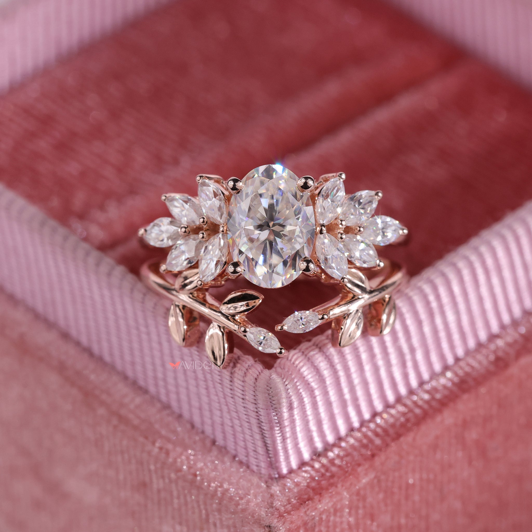 Handmade bridal set with oval and marquise cuts in a leaf style setting.

