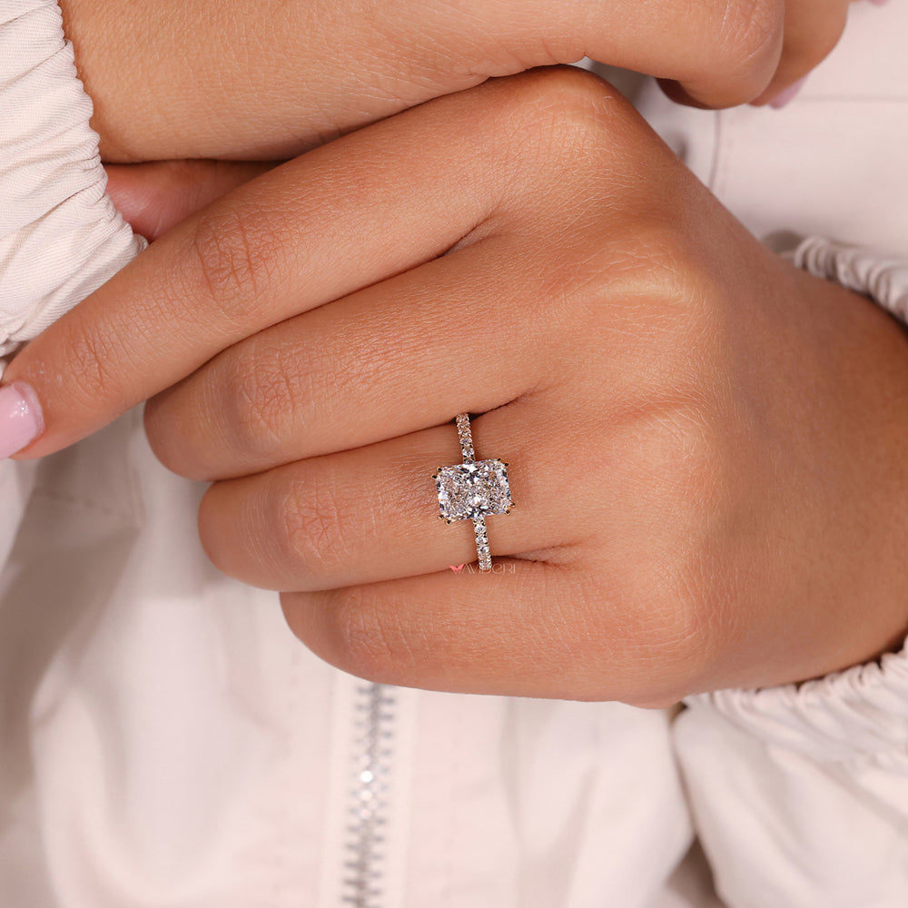 Double prong engagement ring with elegant handmade jewelry accents.
