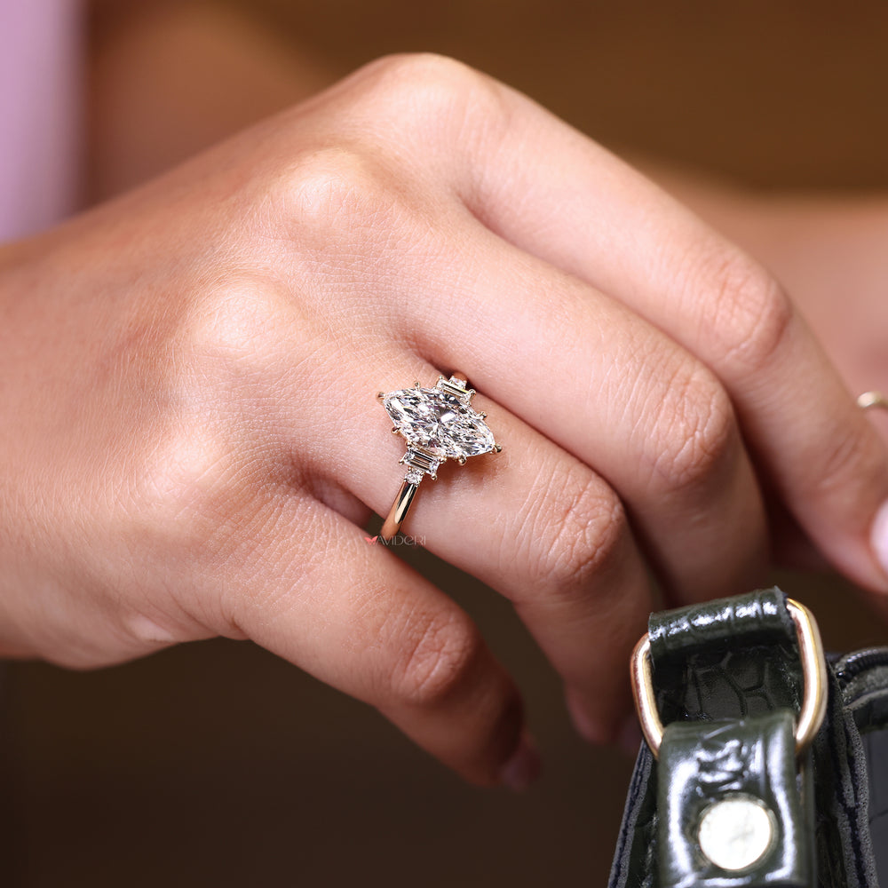 Five diamond engagement ring with a yellow gold band and custom six claw prong setting.

