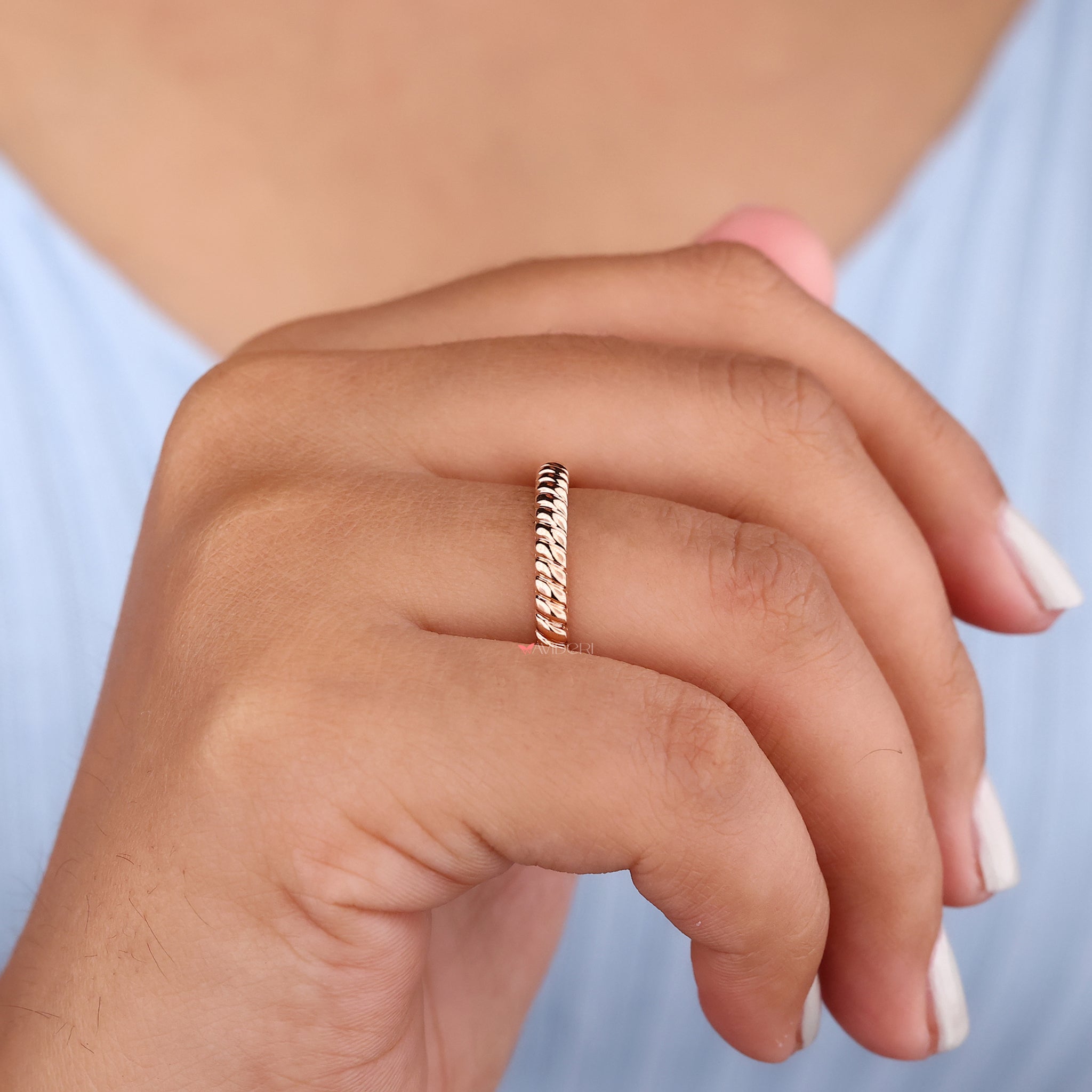 Round moissanite band sparkles brilliantly with ethical moissanite stones in a sleek design.
