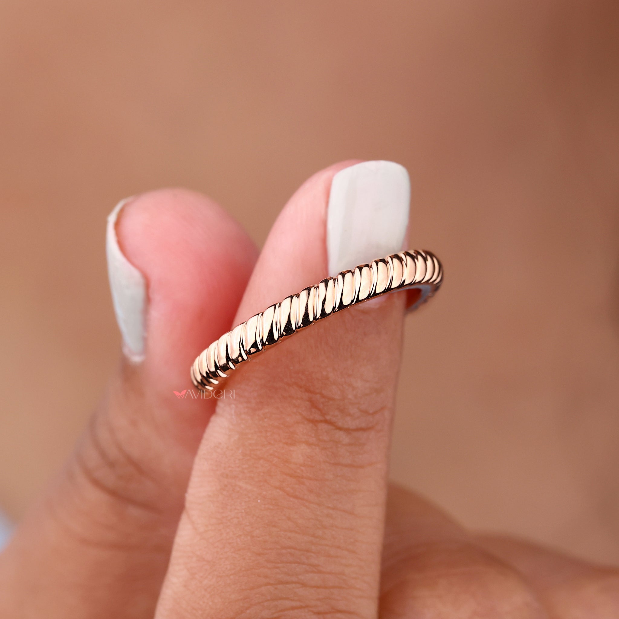 Moissanite wedding band offers brilliant shine with an eco-conscious sparkle.

