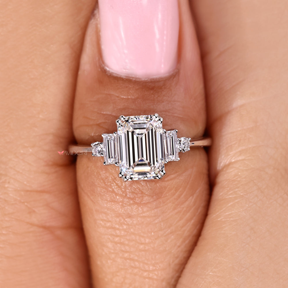 Lab grown emerald cut diamond ring five stone style.
