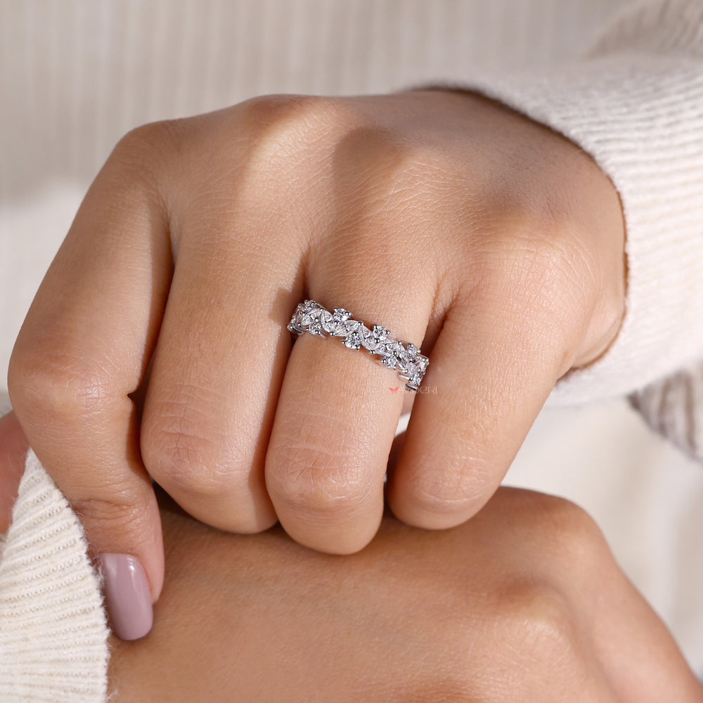 Handmade jewelry with unique diamond band designs.

