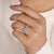 Marquise and round diamond band set in a unique zig-zag design.
