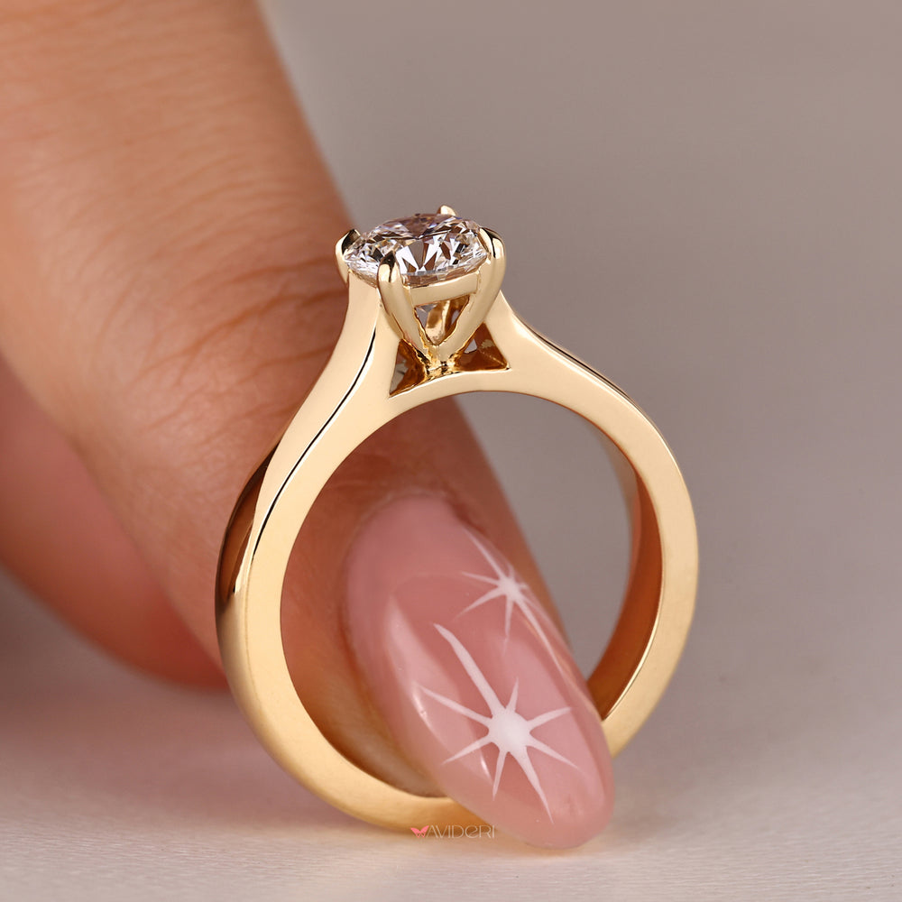 Classic yellow gold engagement ring with unmatched elegance.
