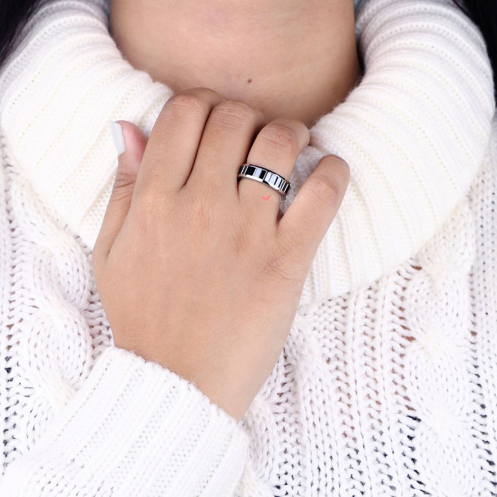 Channel set wedding band featuring baguette diamonds for a perfect fit.
