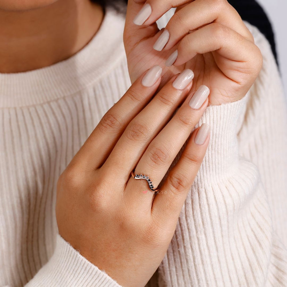 Handmade jewelry featuring a custom wedding band.