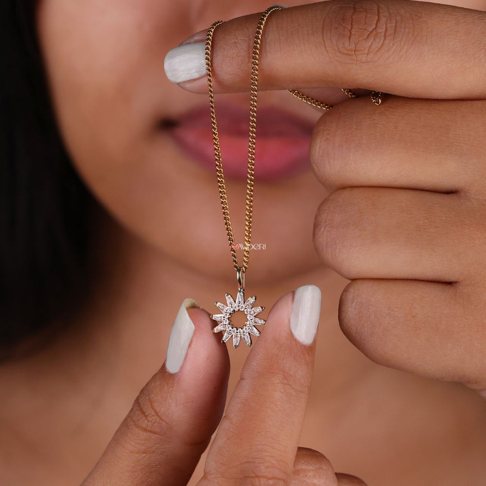 By gold pendant with a sleek and stylish finish.
