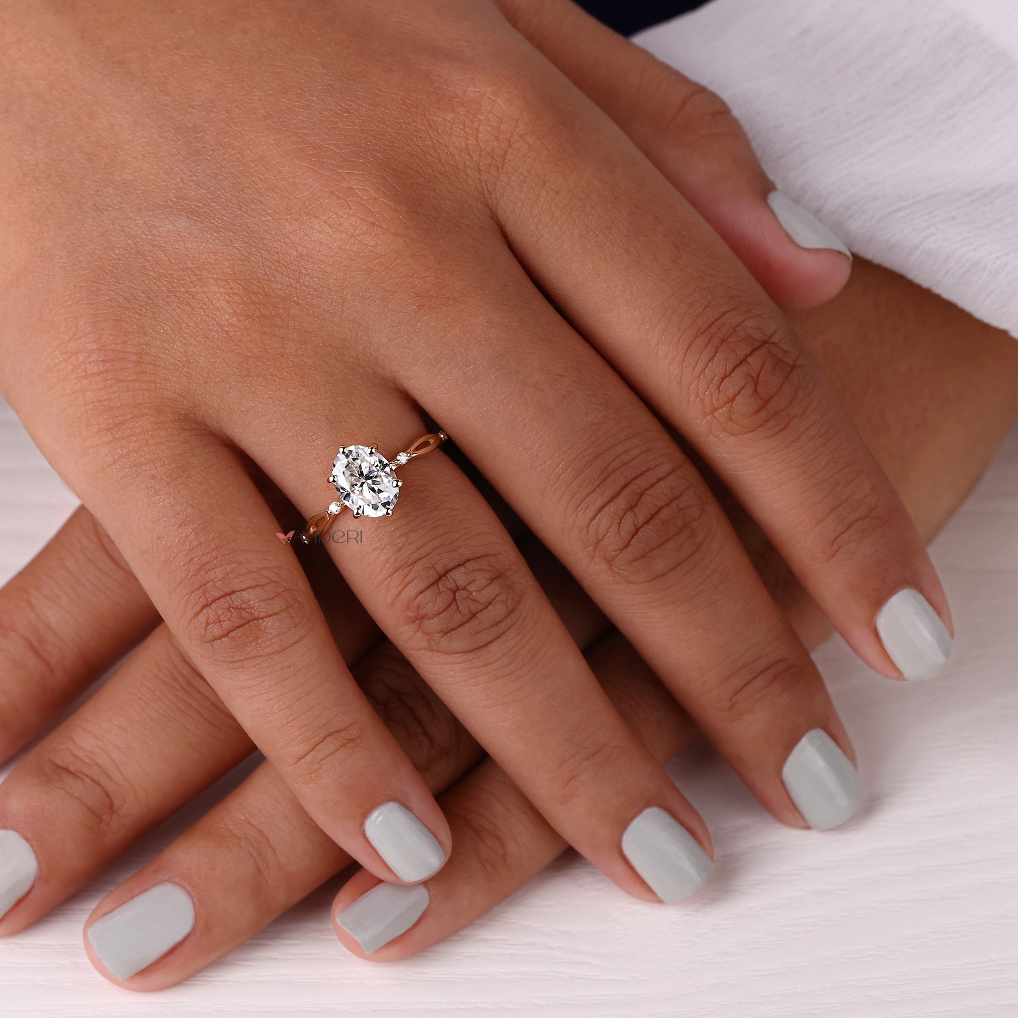 Yellow gold engagement ring featuring a Oval center stone.
