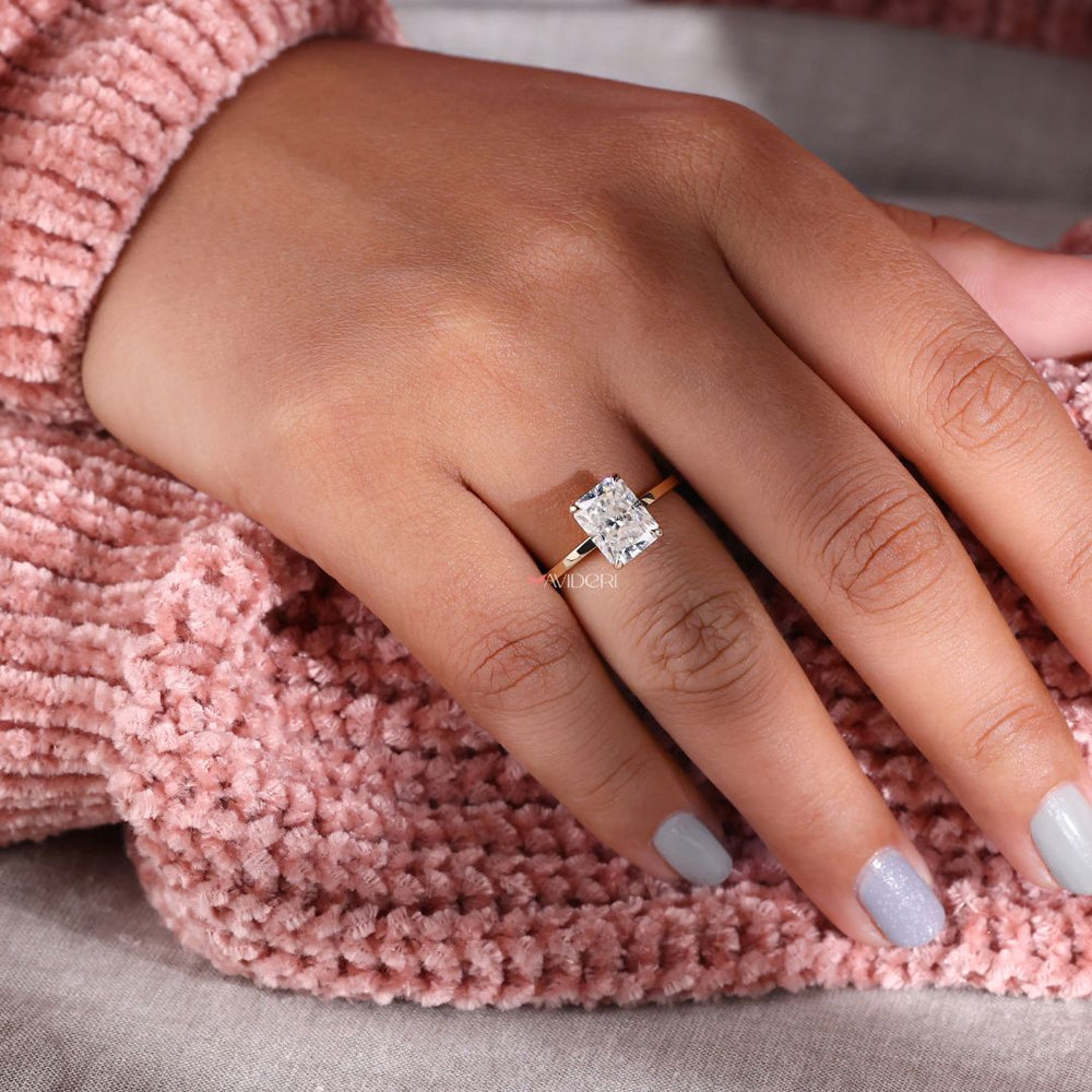 Four claw prong ring showcasing a secure and timeless setting.
