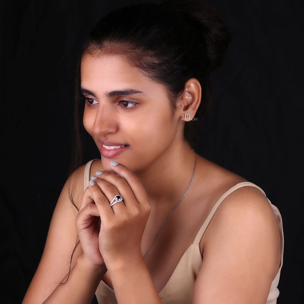 IGI certified earrings featuring round cut diamonds
