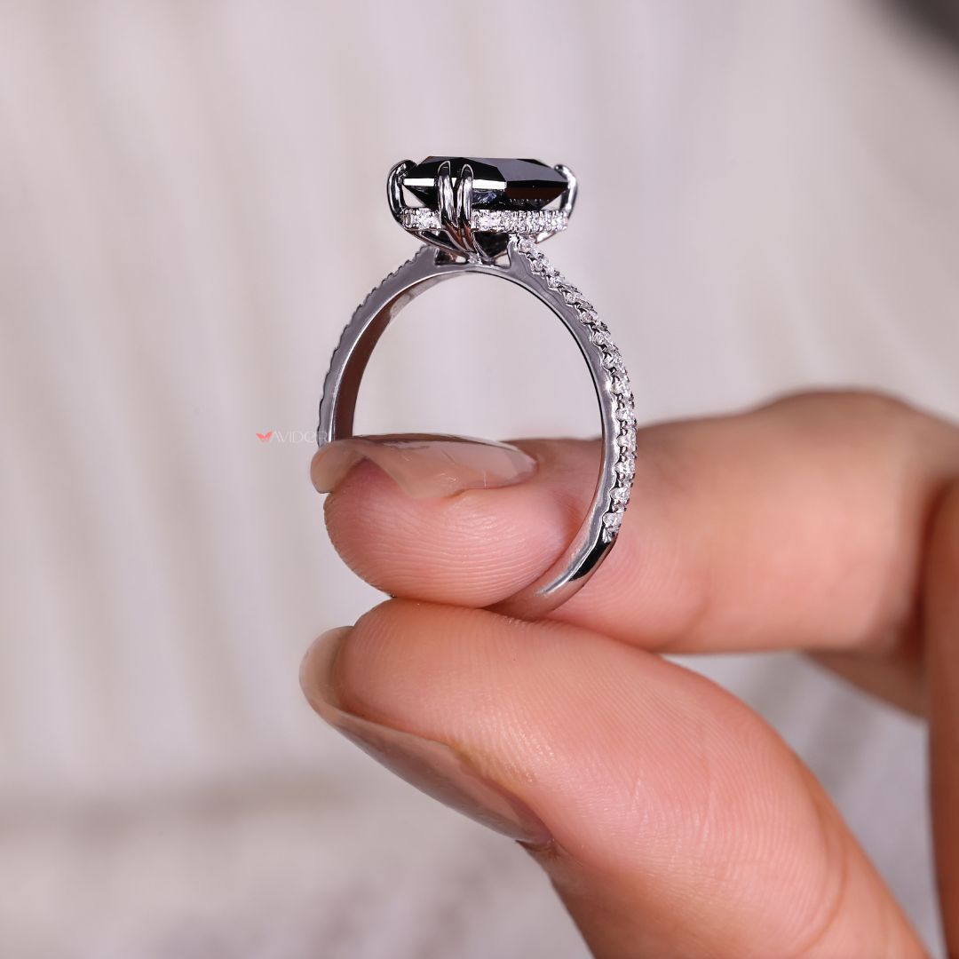 Hidden halo setting around a custom center stone.
