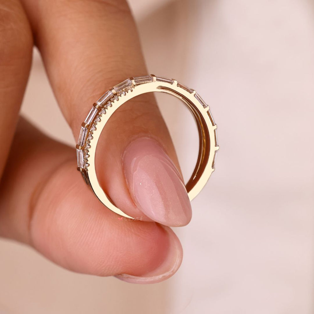 Classic yellow gold wedding band with polished finish.
