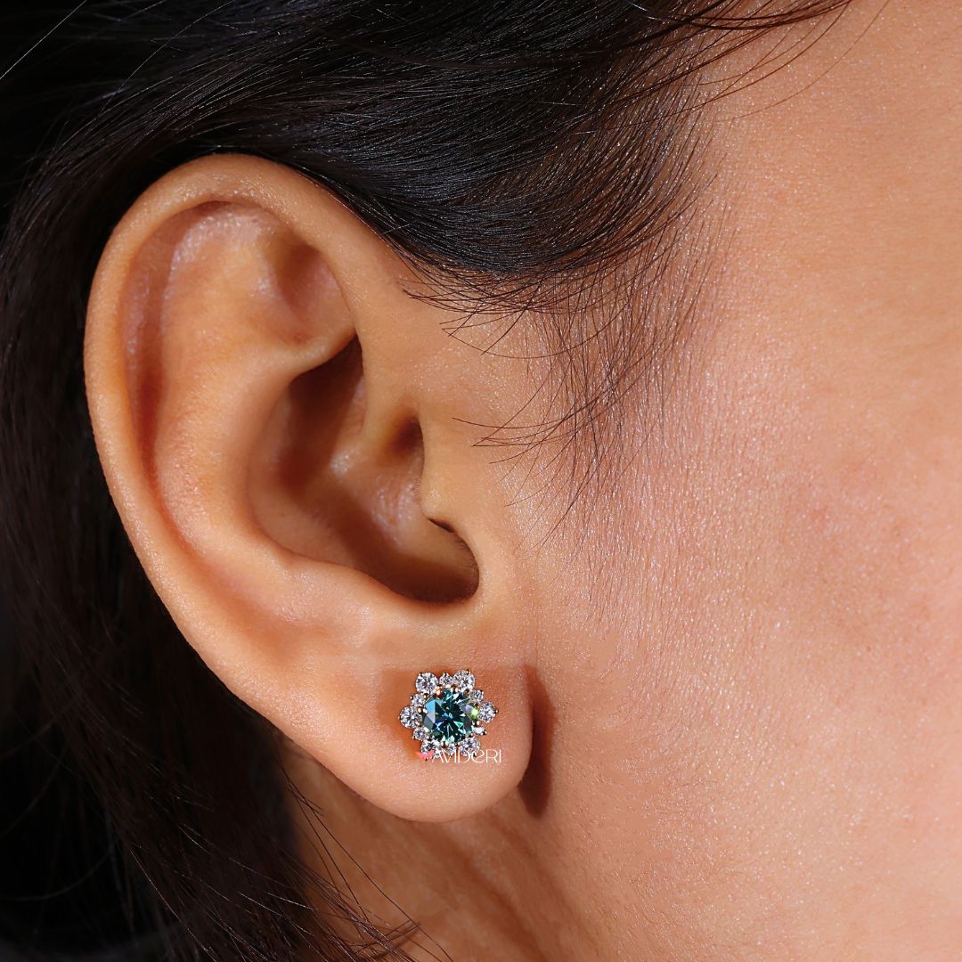 Moissanite earrings in a unique cluster flower design set in yellow gold.