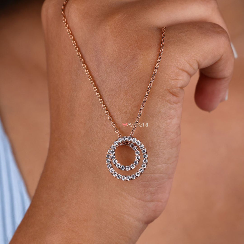Rose gold pendant with a warm, rich tone.
