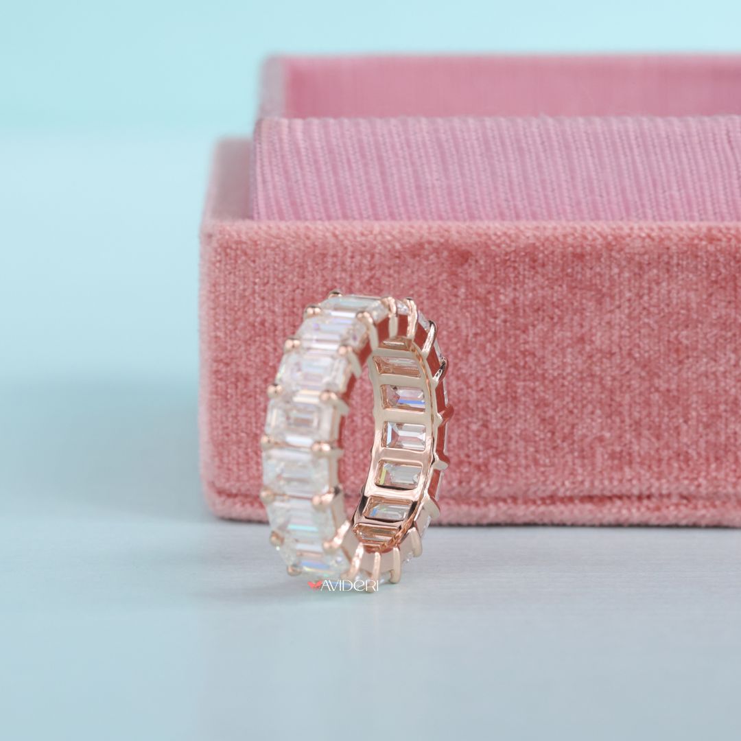 Shared prong setting allows light to pass through each stone for extra sparkle.
