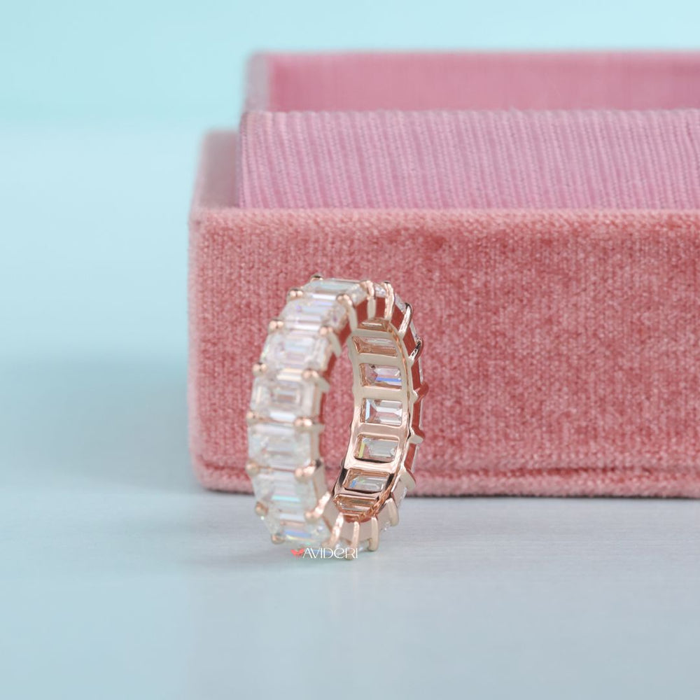 Shared prong setting allows light to pass through each stone for extra sparkle.
