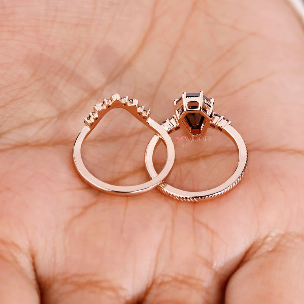 Rose gold engagement ring with a coffin ring design for elegance.