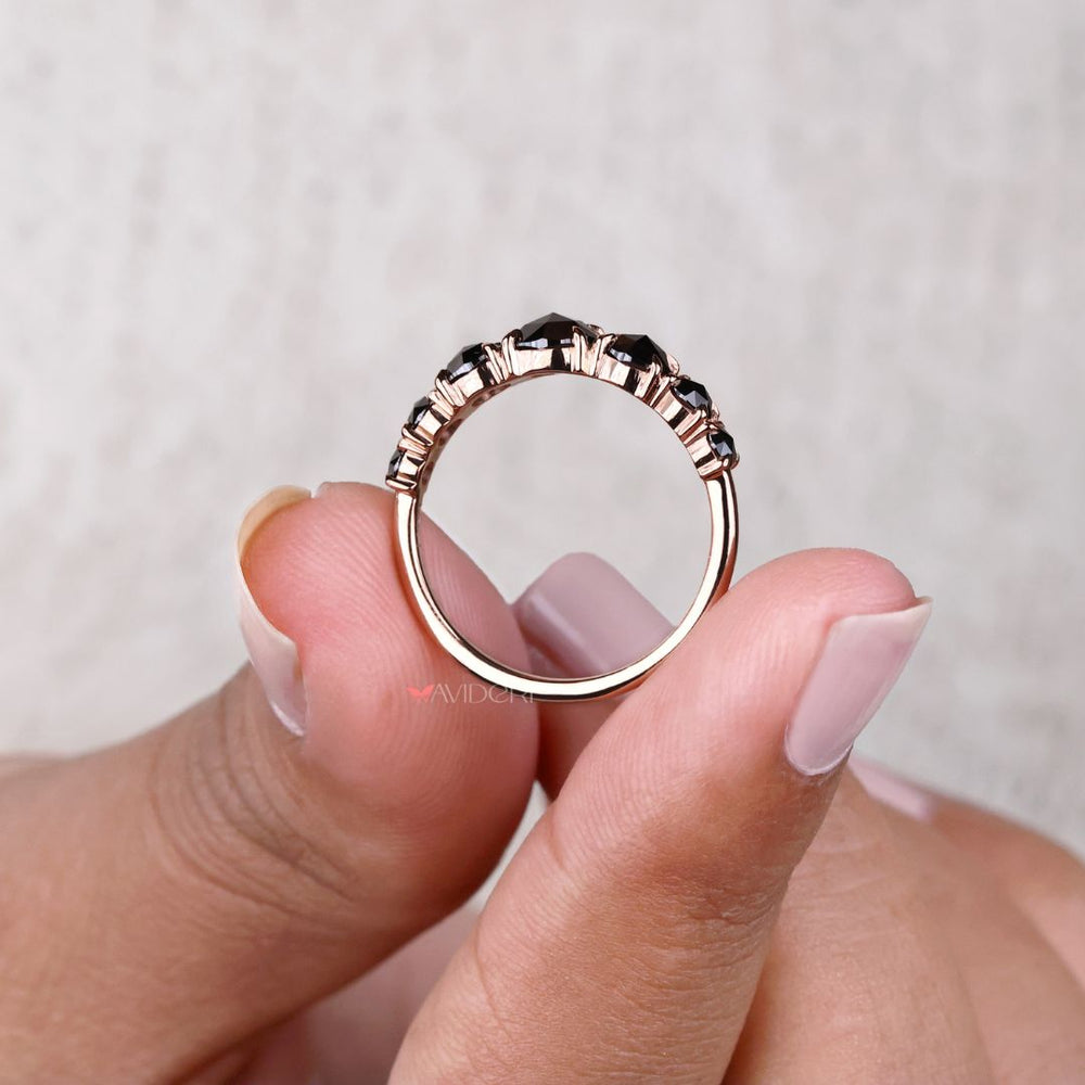Classic rose gold band with a round cut wedding band design.
