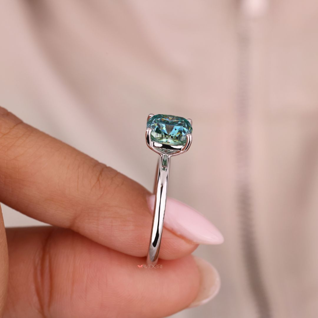 Handmade ring with a cushion cut diamond for a unique, custom feel.
