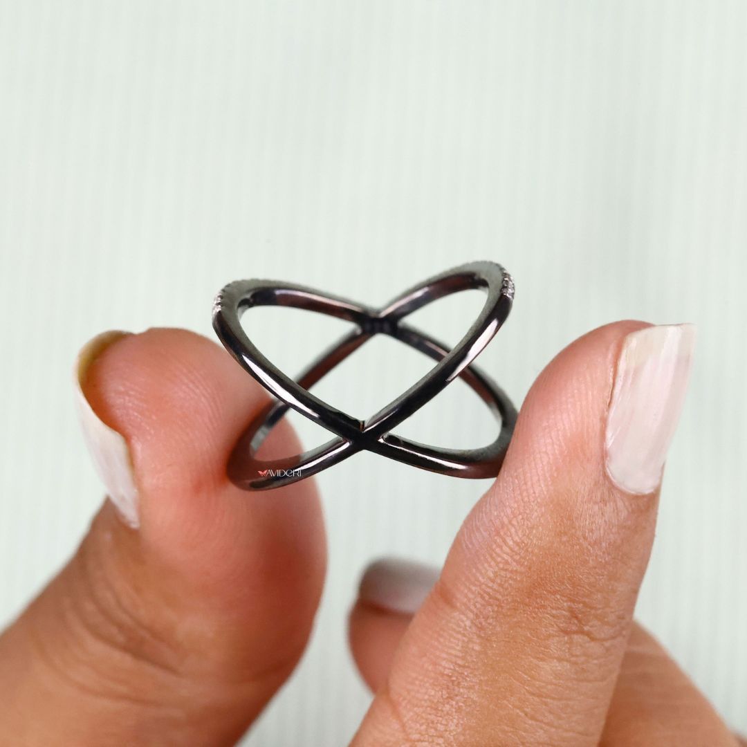 Round cut moissanite band sparkles brilliantly in a sleek, minimalist style.
