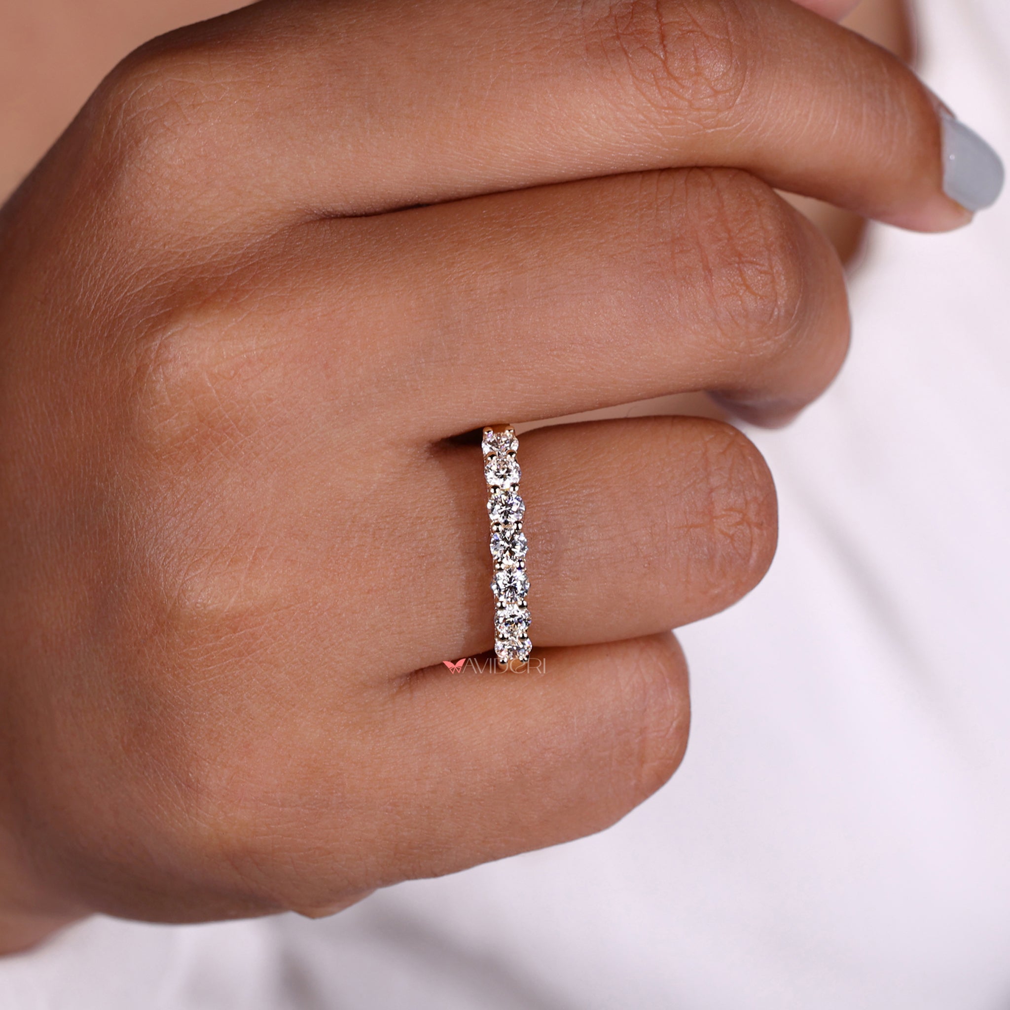 U shaped wedding band featuring a unique design.
