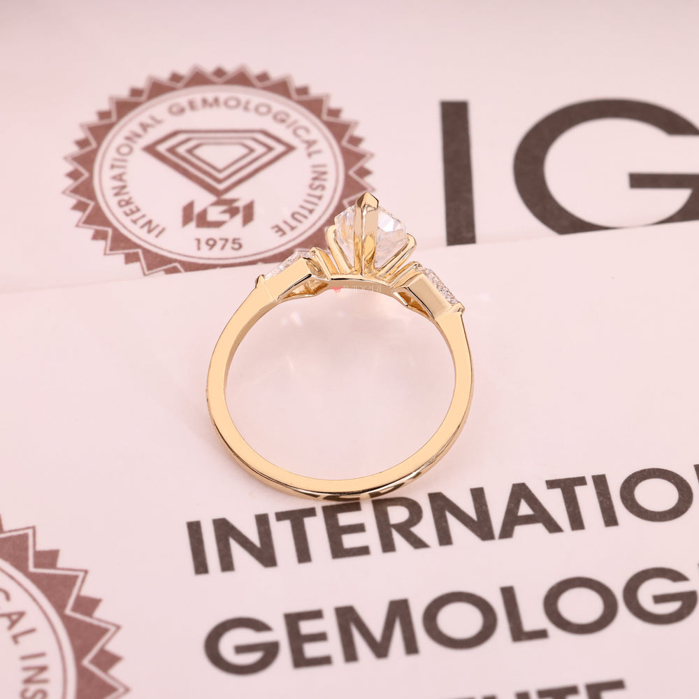 Lab grown three stone diamond ring IGI certified.

