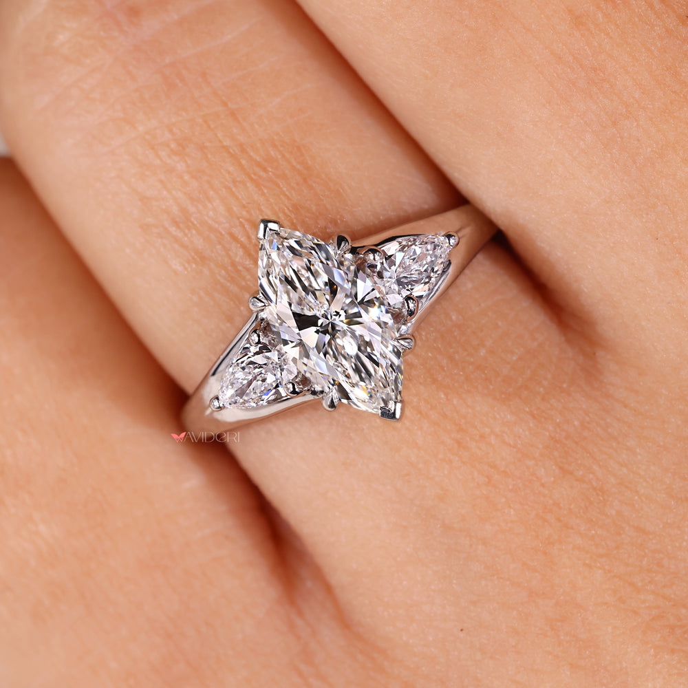 V prong setting with marquise and pear diamonds.