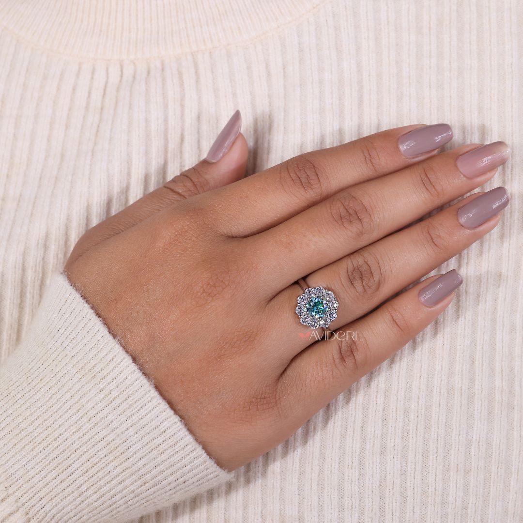 Cluster halo engagement ring shines brightly with layered sparkle and symmetry.

