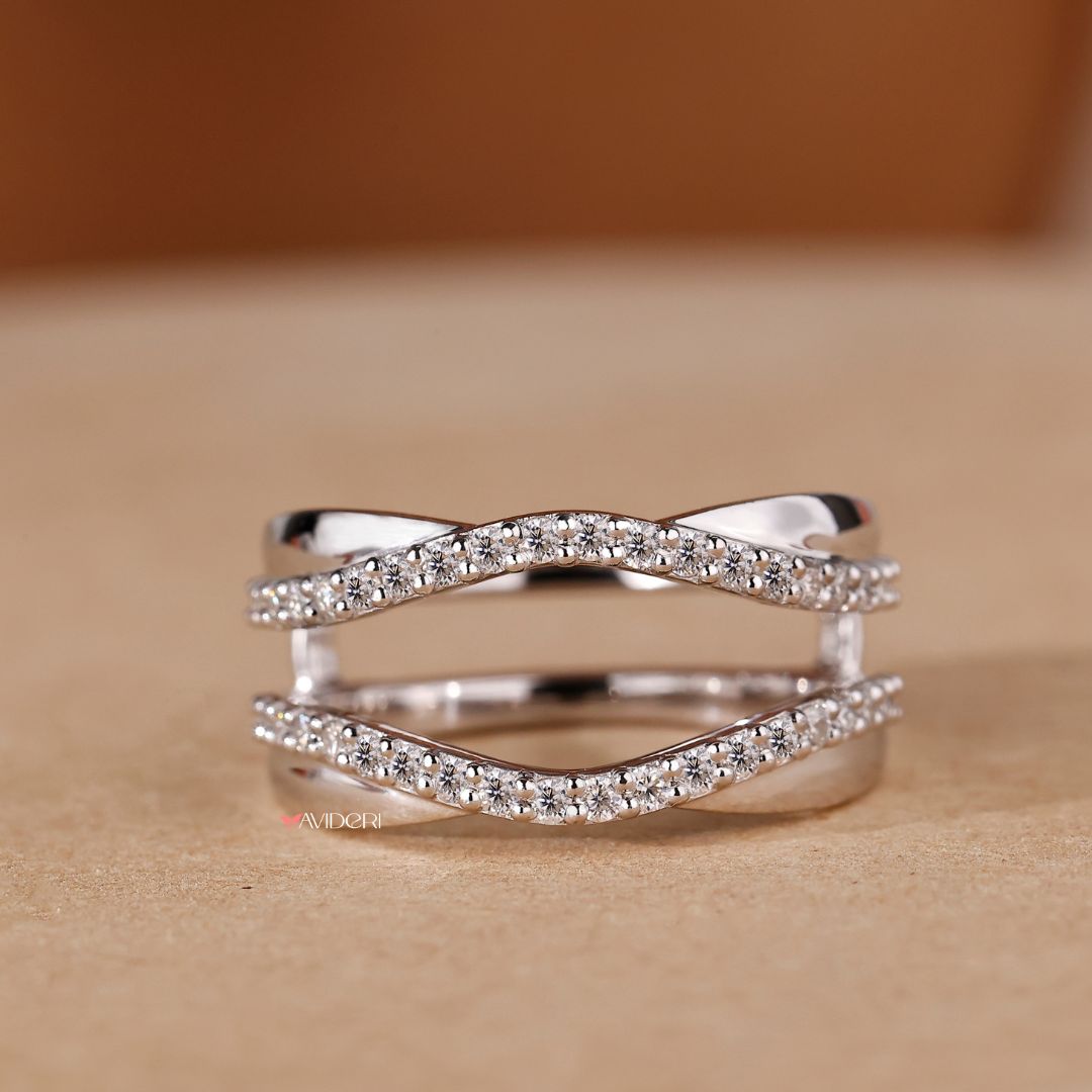 A white gold wedding band offers a sleek, polished finish.