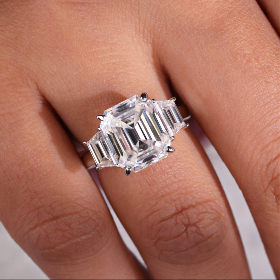 Moissanite emerald cut ring with a stunning, modern design.
