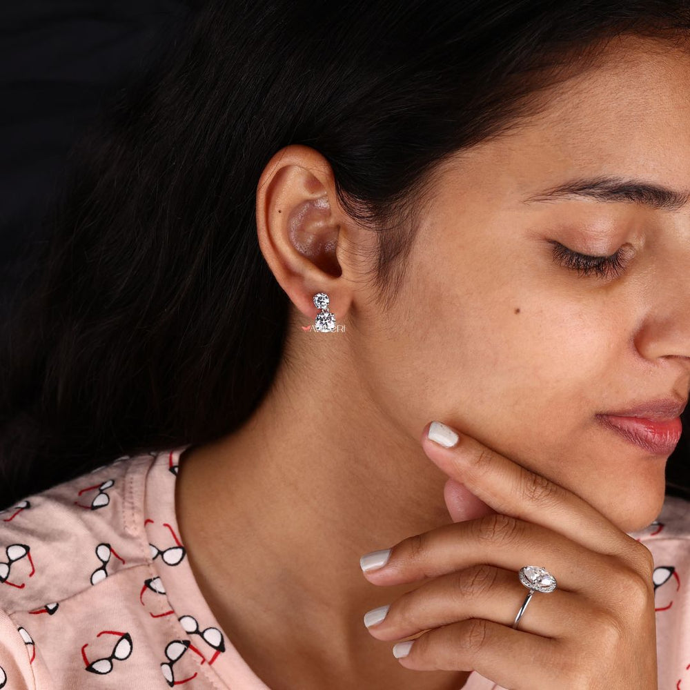 Wedding gifts for women with stunning round cut Moissanite halo earrings.