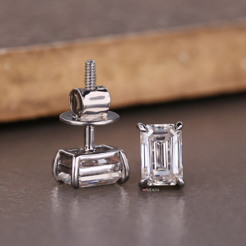 Emerald cut earrings feature sharp lines and brilliant clarity.