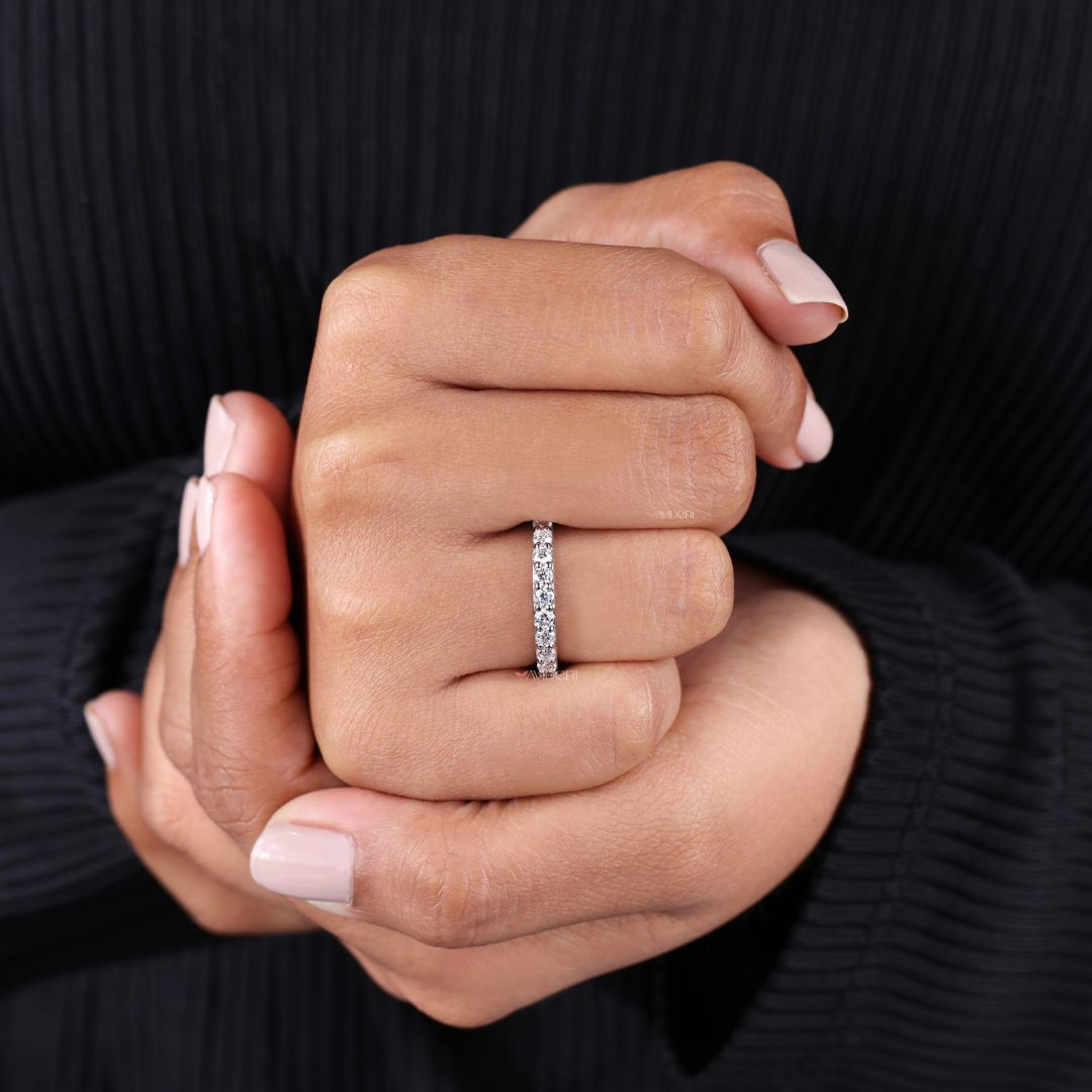 Stackable wedding ring layers perfectly with other bands for a bold or delicate look.
