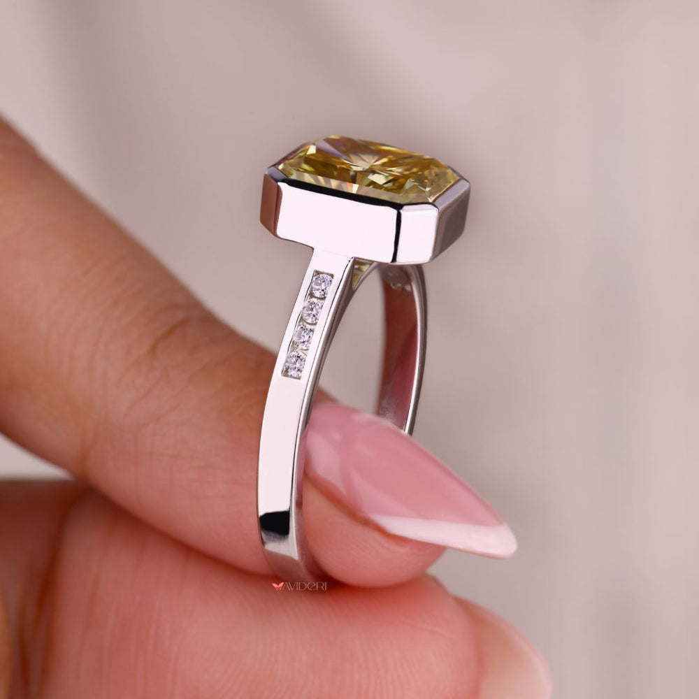 White gold and diamond ring with a bezel setting
