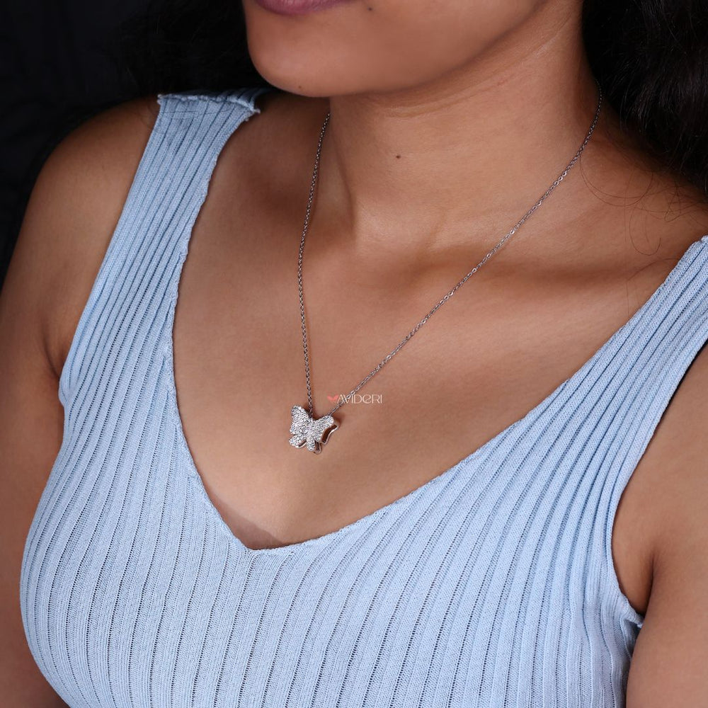 Avideri pendant showcasing a white gold butterfly motif
