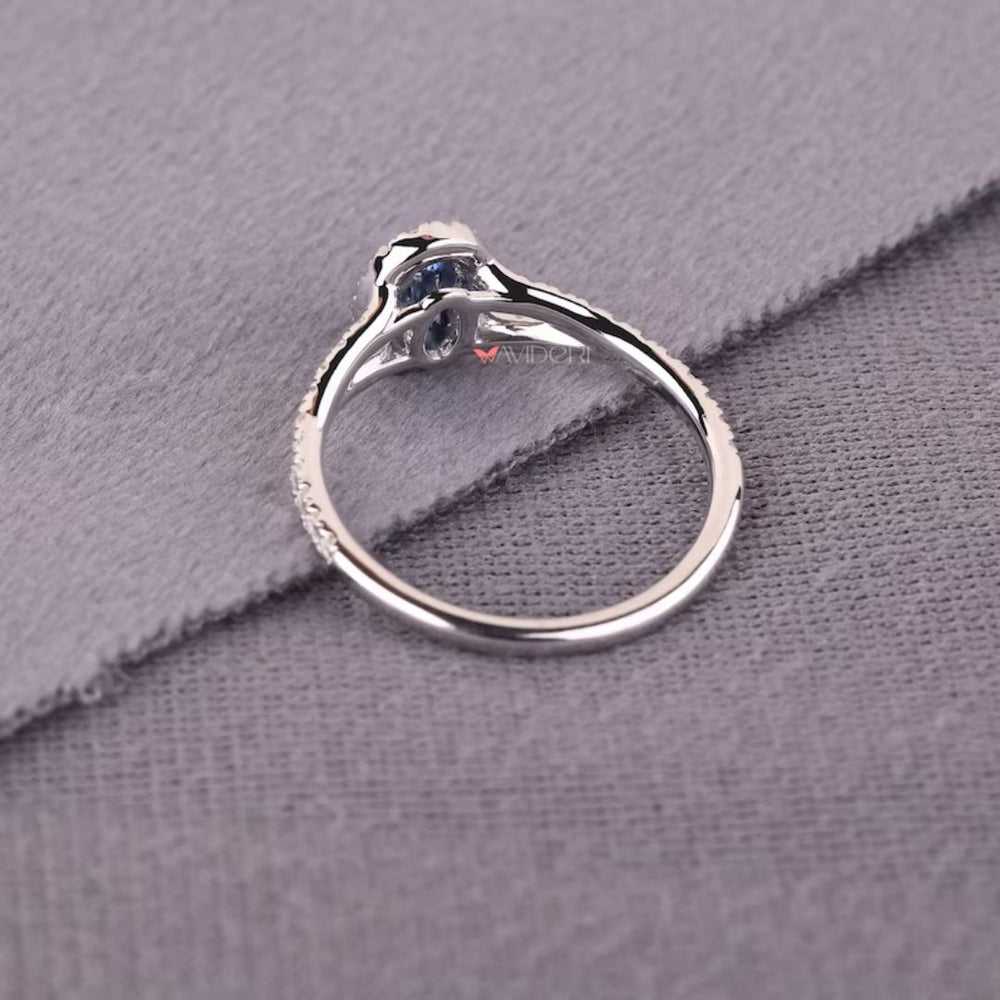 Handmade jewelry features detail of avideri ring.