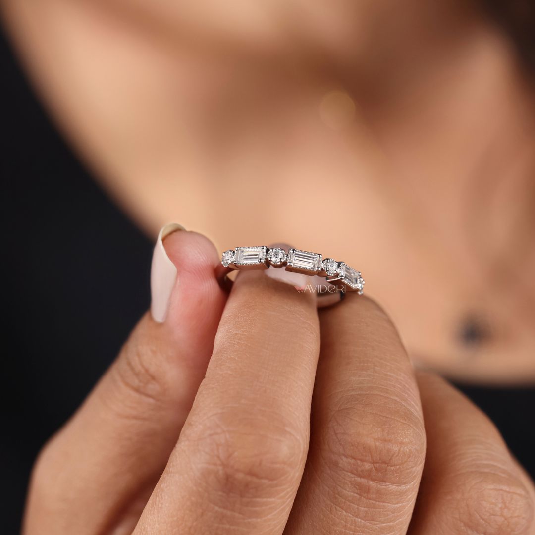 Baguette and round cut moissanite create a dynamic mix of sparkle and structure.
