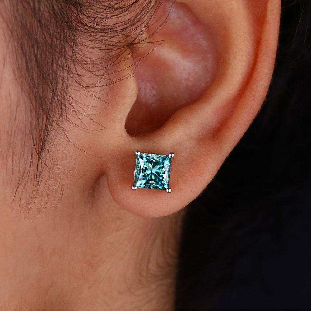 Cyan Blue Princess Cut Moissanite earrings in 4 prong settings.