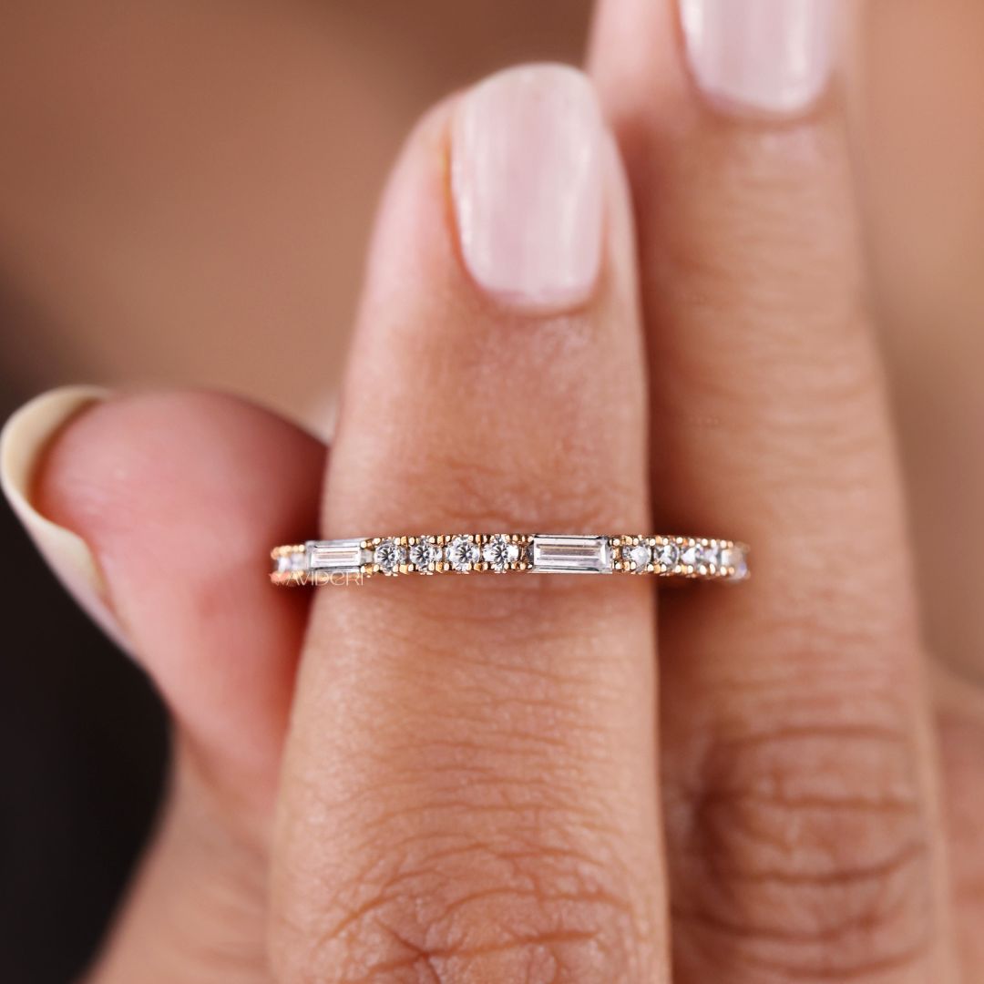 Moissanite wedding band offers lasting shine with an ethical choice of stone.
