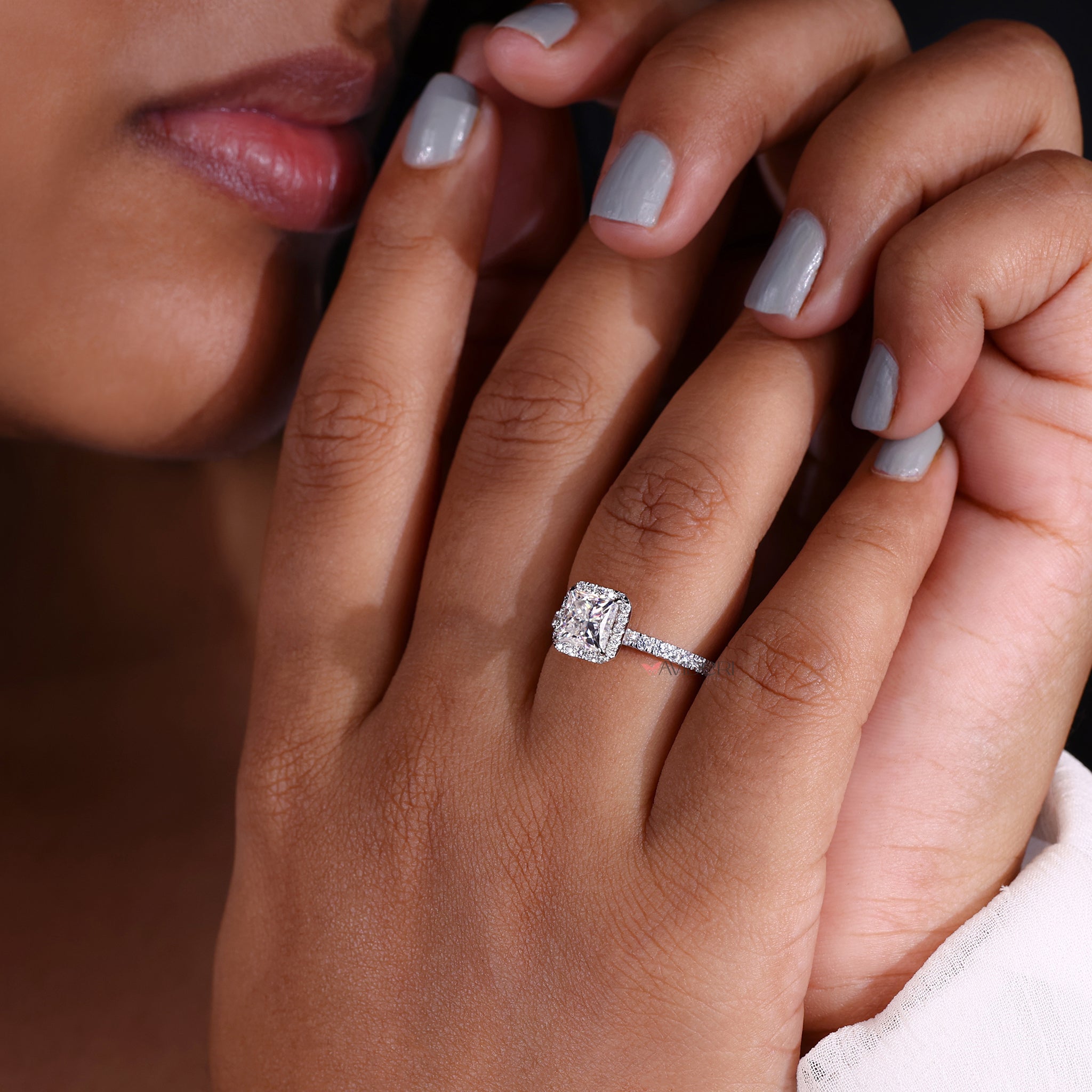 Princess cut ring with sharp, elegant edges.
