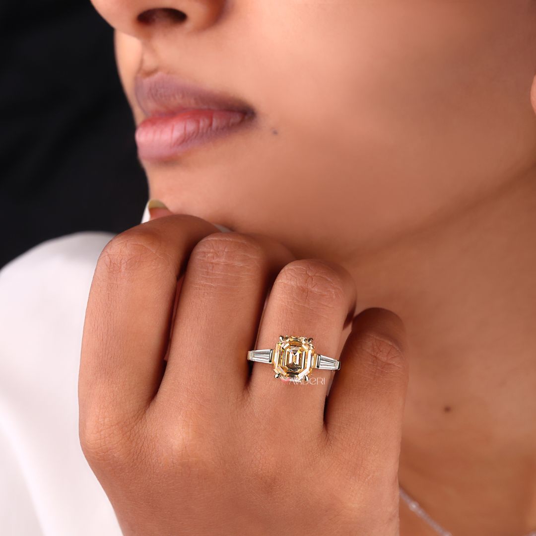 Three stone ring with a cathedral setting structure
