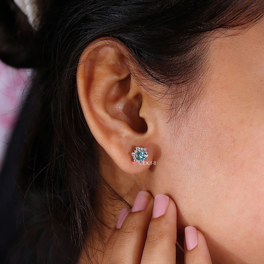 Stud earrings featuring a cluster flower design with Moissanite stones.