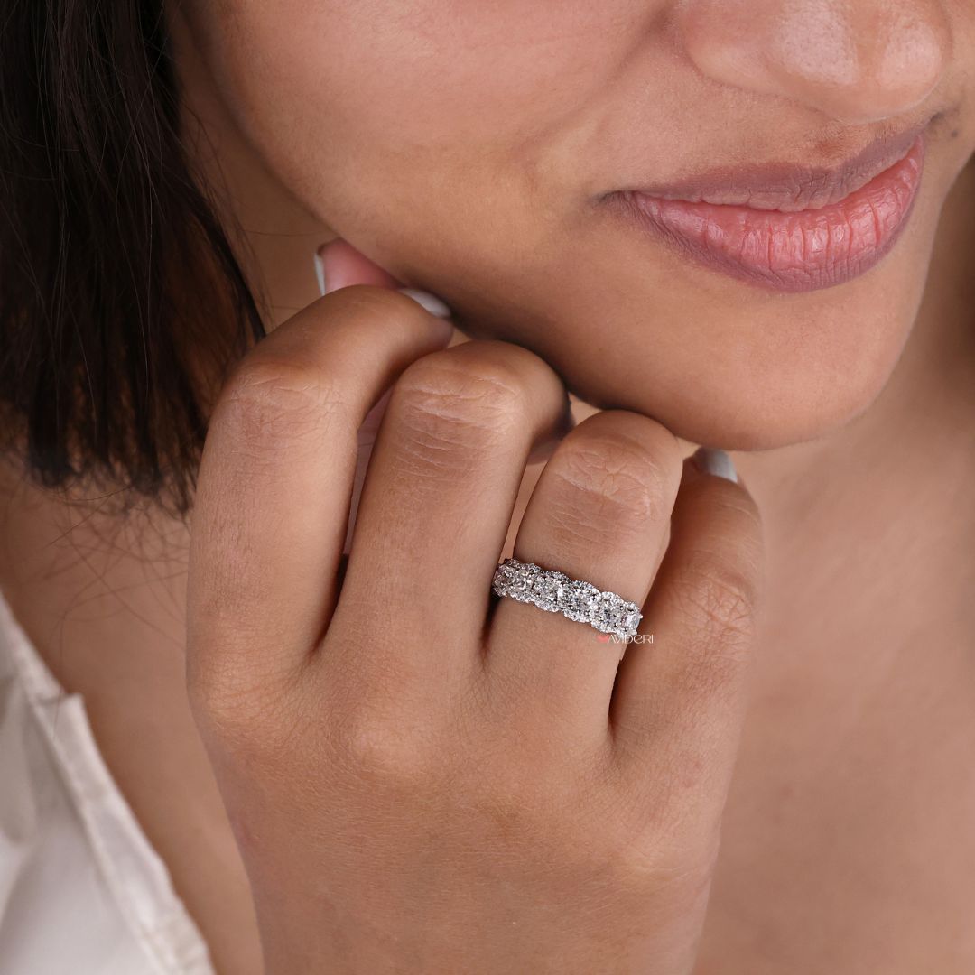 Square cushion wedding band features elegant corners and a bold, vintage-inspired look.
