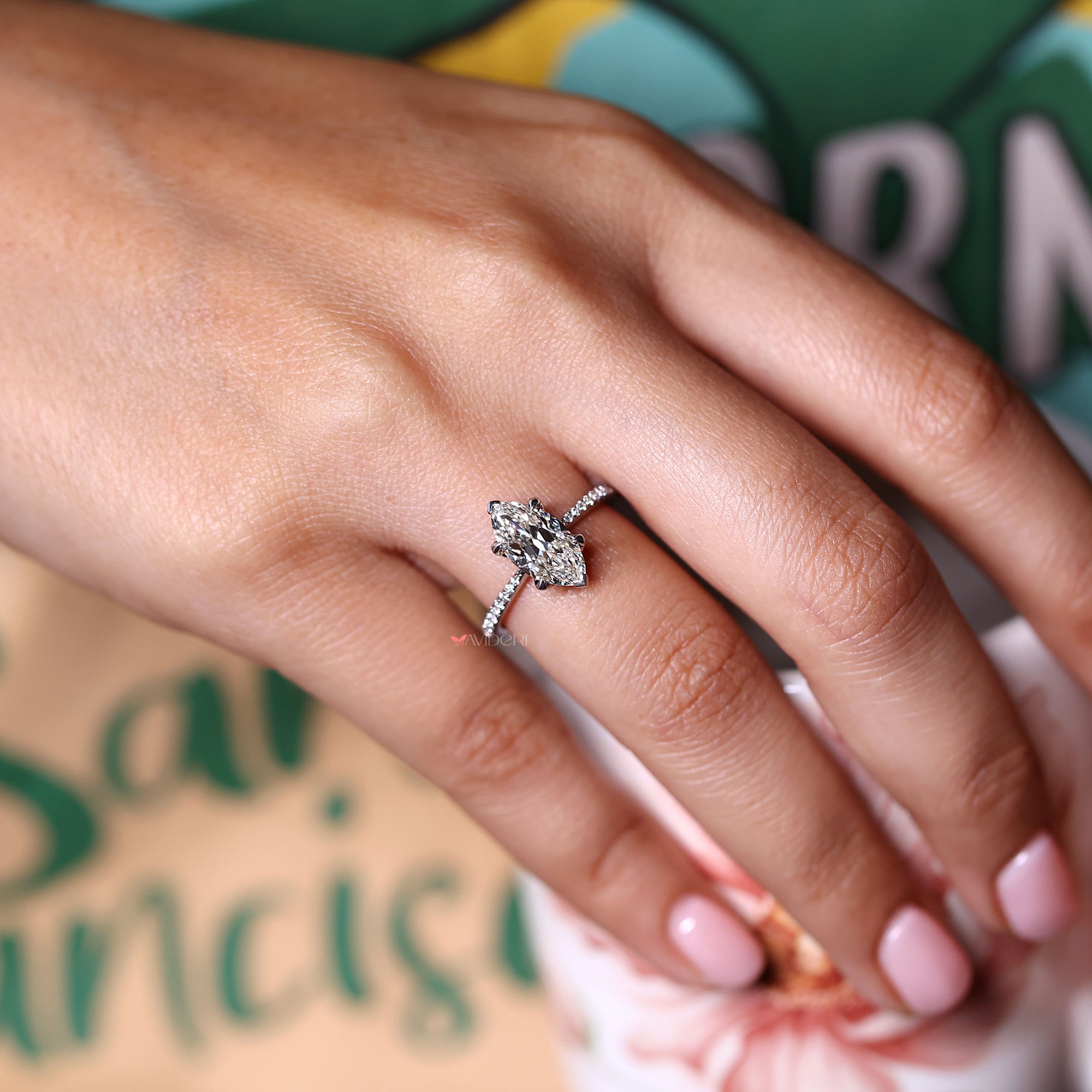 Marquise old European cut ring featuring a tapered shank design.