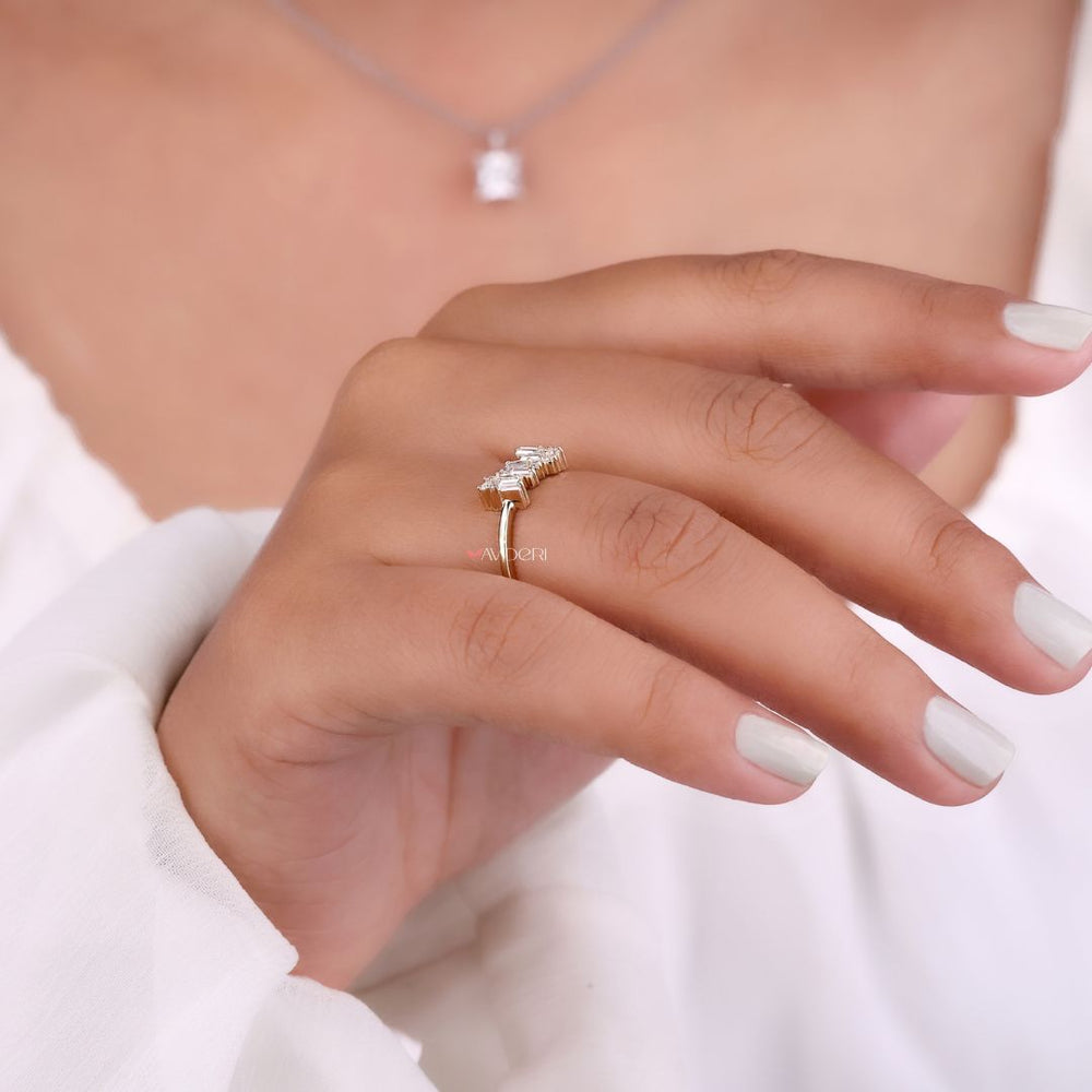 A close-up of a baguette moissanite ring from Avideri.
