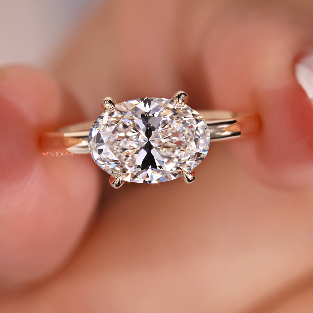 East west engagement ring, 4 claw prong ring, claw prong ring
