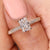 Handmade jewelry with radiant diamond engagement ring.