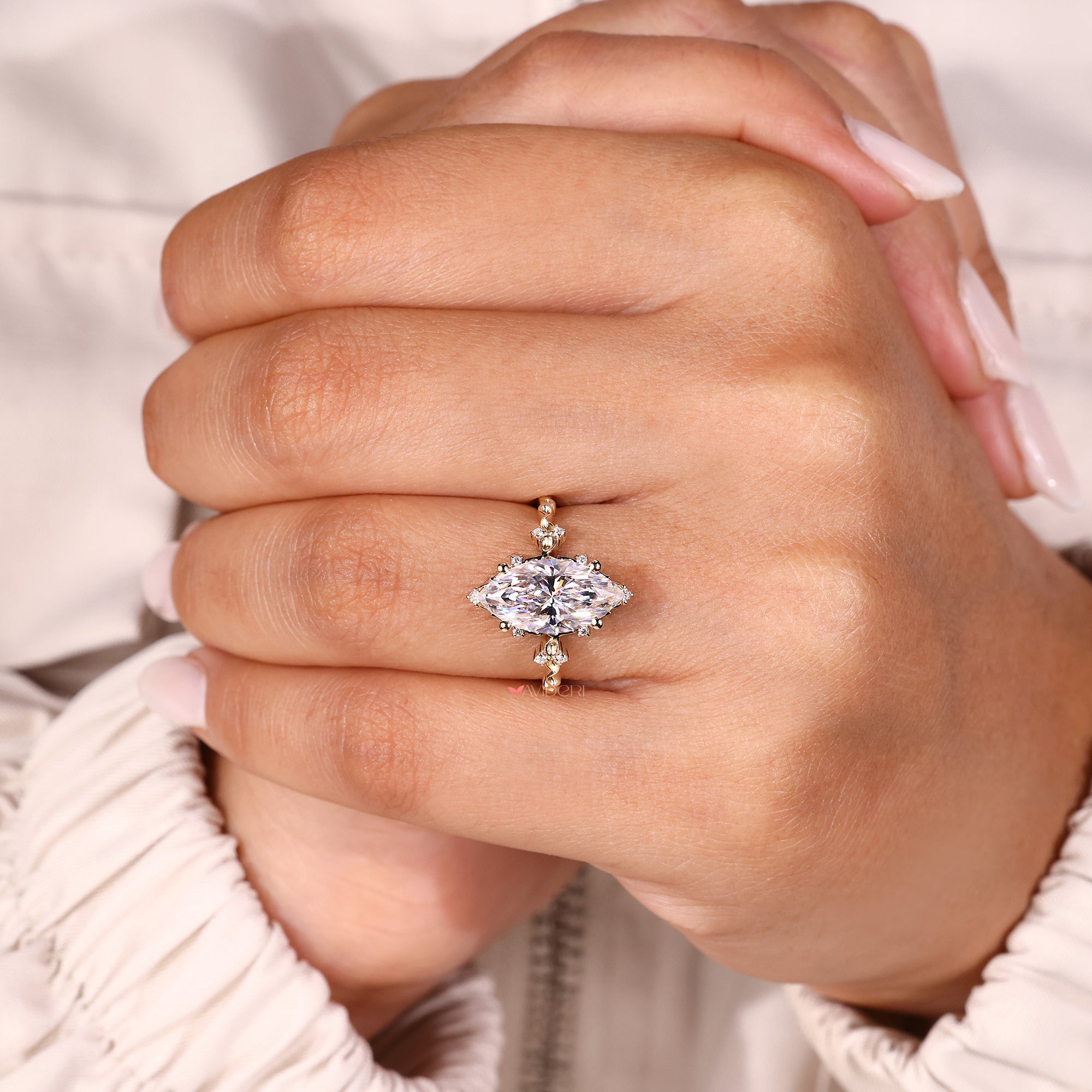 4 prong setting used in unique engagement ring.